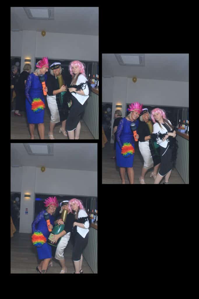 Group in colourful wigs and hats at party